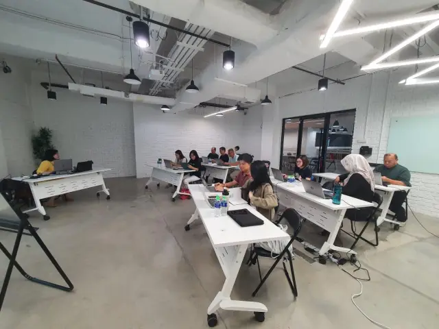 Participants at work during a classroom session