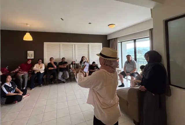 A facilitator leading a group discussion