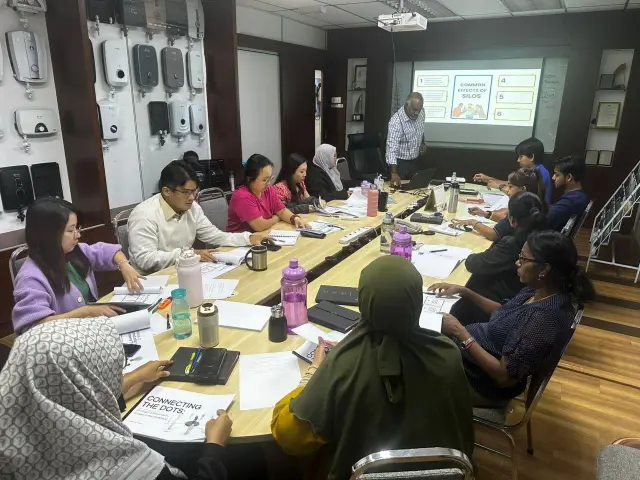 Participants working through an exercise during a The Dune Academy workshop